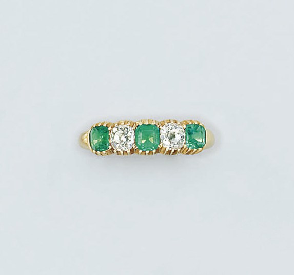 A late 19th century gold, emerald and diamond five stone ring