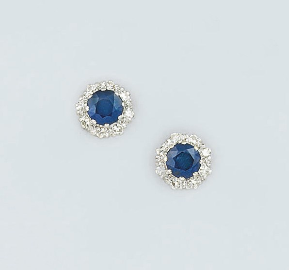 A pair of diamond and sapphire cluster earstuds