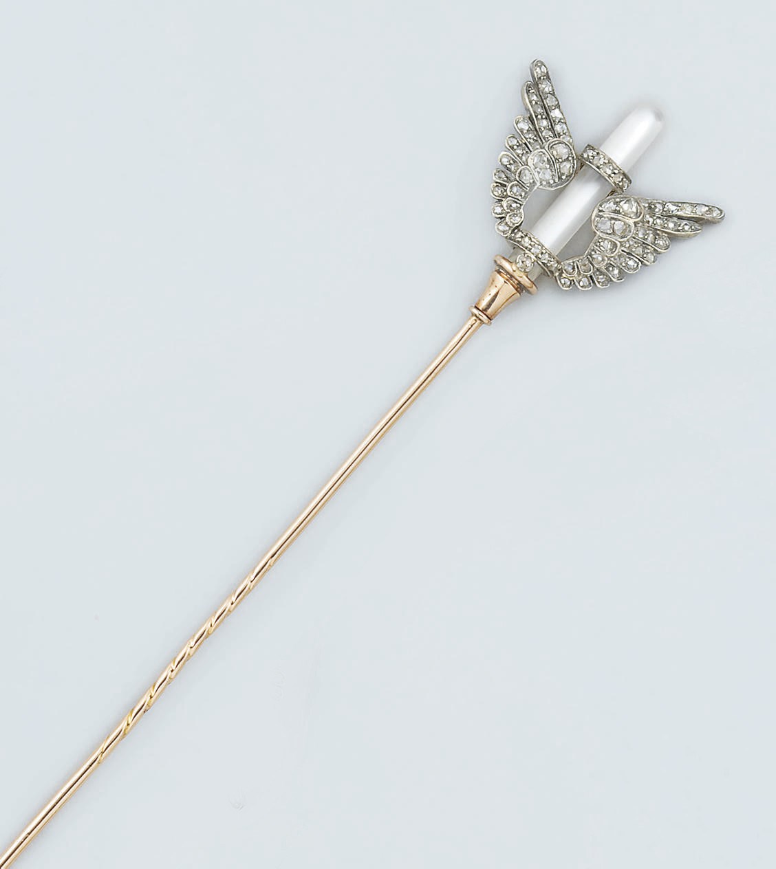 A late 19th century French diamond and rock crystal hatpin