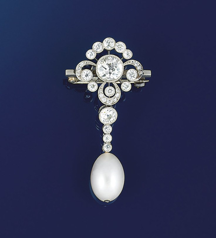 An Edwardian diamond and pearl brooch