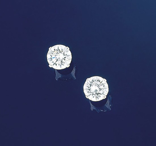 A pair of single stone diamond earstuds