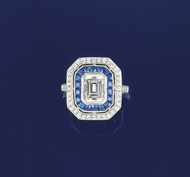 A diamond and sapphire ring