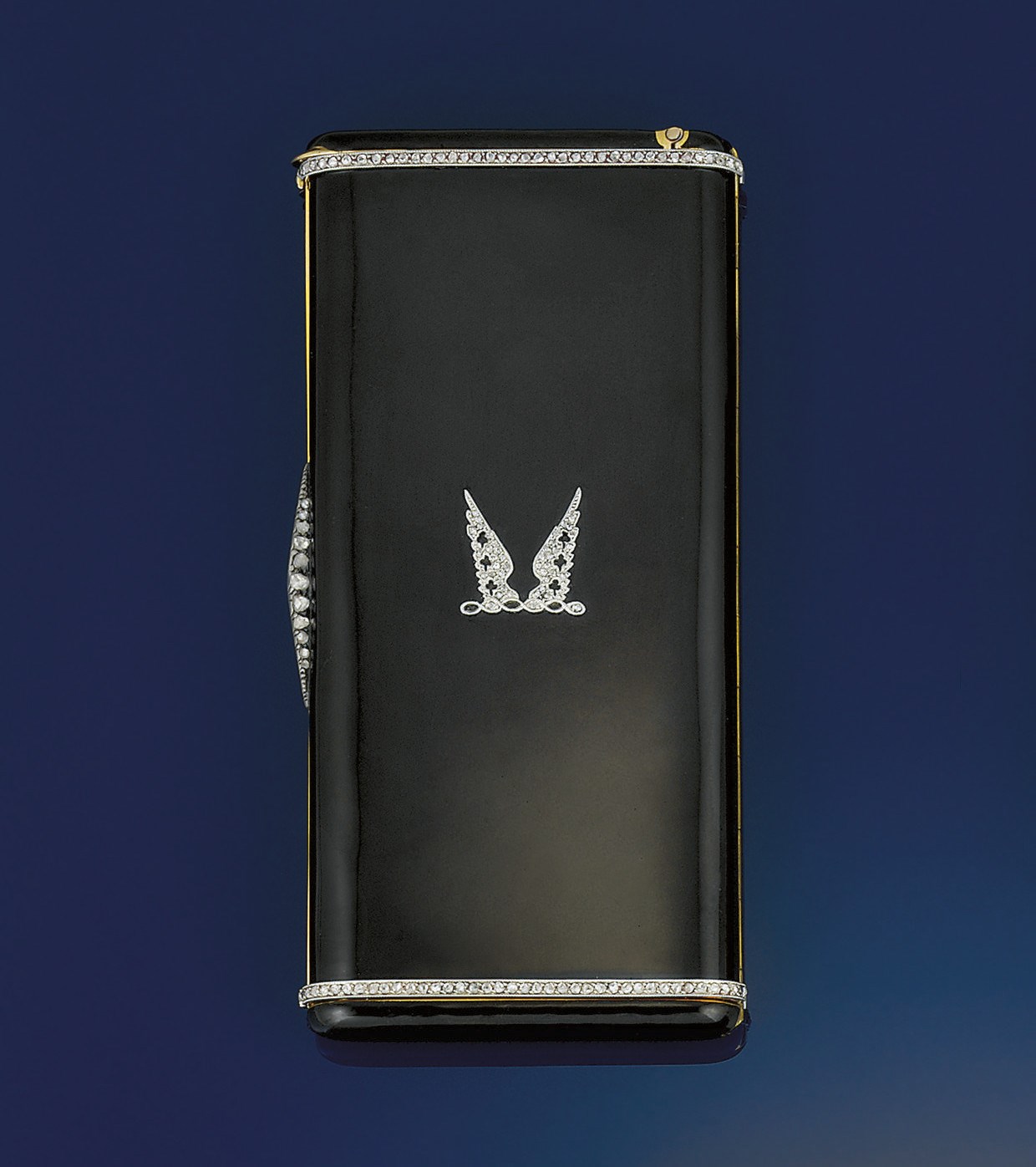 An Art Deco gold, diamond and enamel cigarette case by Cartier
