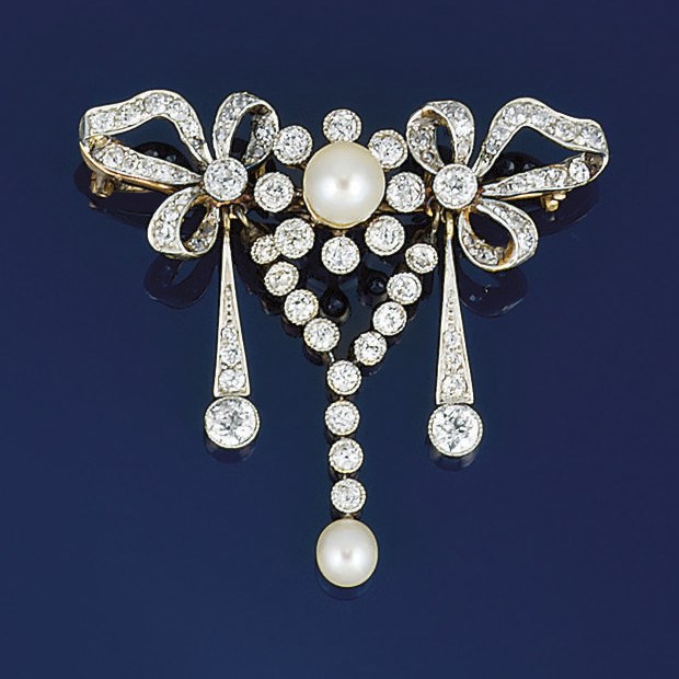 An Edwardian pearl and diamond brooch