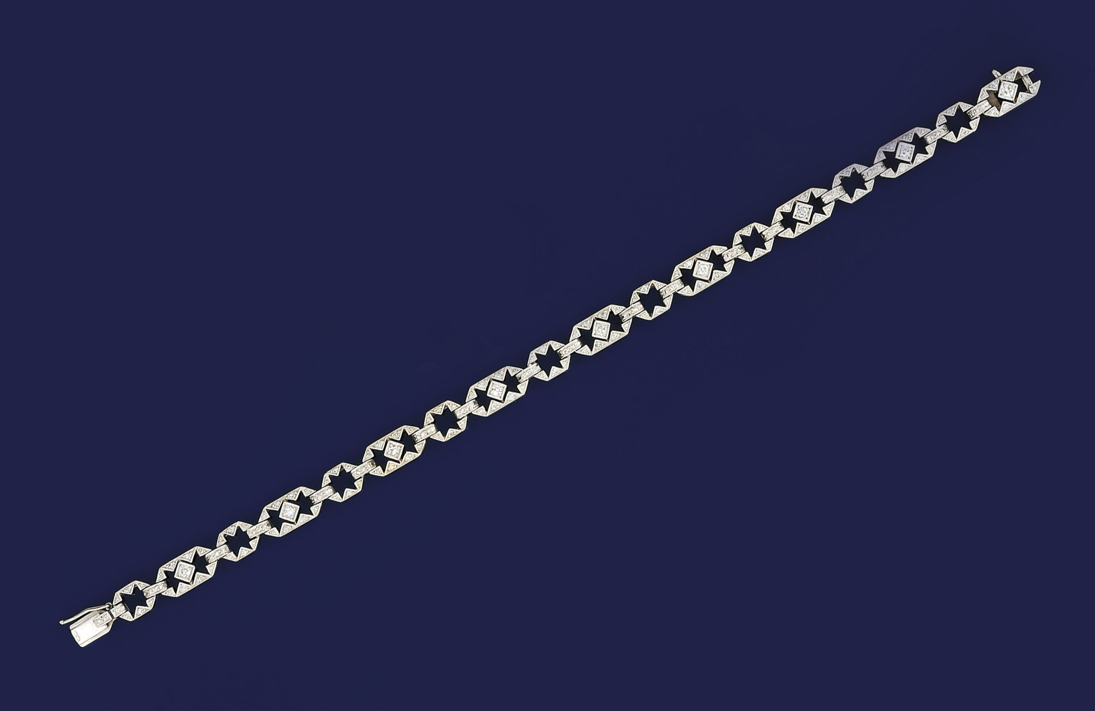 An Art Deco platinum and diamond bracelet