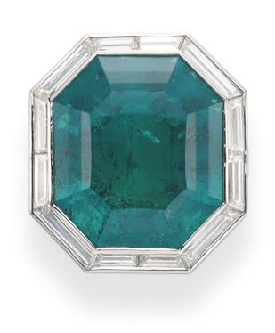 AN EMERALD AND DIAMOND RING