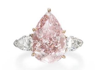 A SUPERB COLORED DIAMOND RING