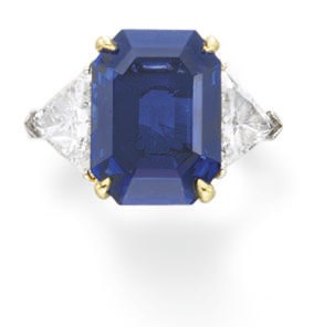 A SAPPHIRE AND DIAMOND RING