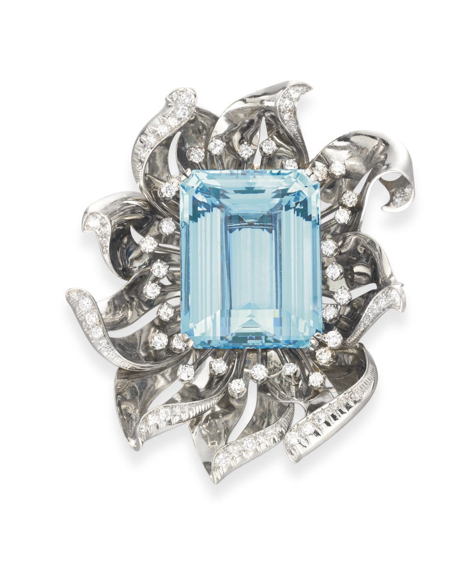 AN AQUAMARINE, DIAMOND AND PLATINUM FLOWER BROOCH