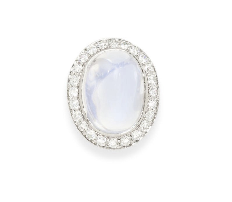 A MOONSTONE AND DIAMOND RING