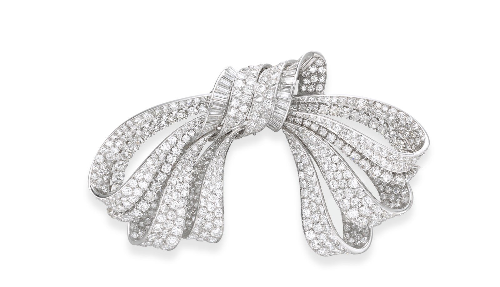 AN ELEGANT RETRO DIAMOND BOW BROOCH, BY VAN CLEEF & ARPELS