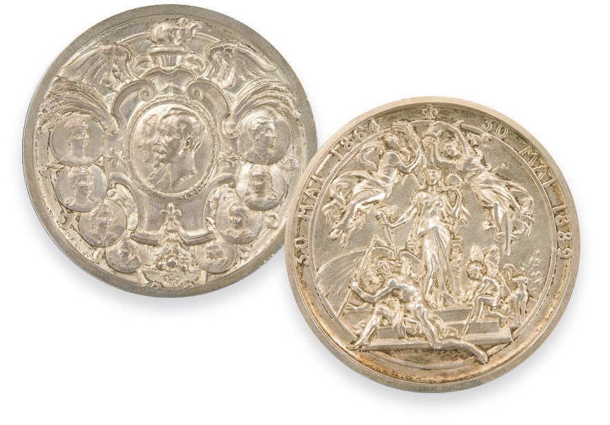 MEDAILLE EN ARGENT ET PIECE COMMEMORATIVE