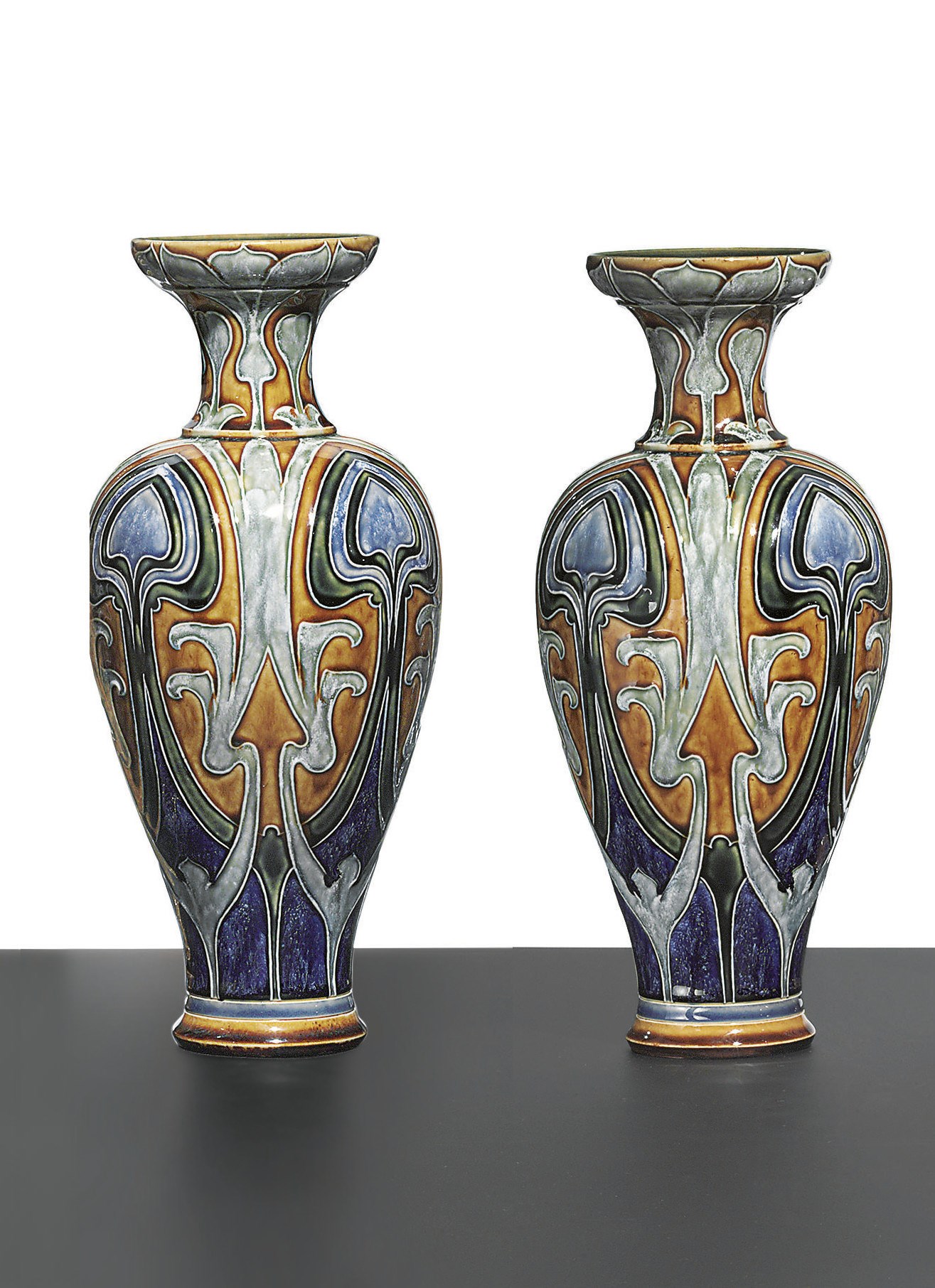 A PAIR OF ROYAL DOULTON STONEWARE POLYCHROME VASES