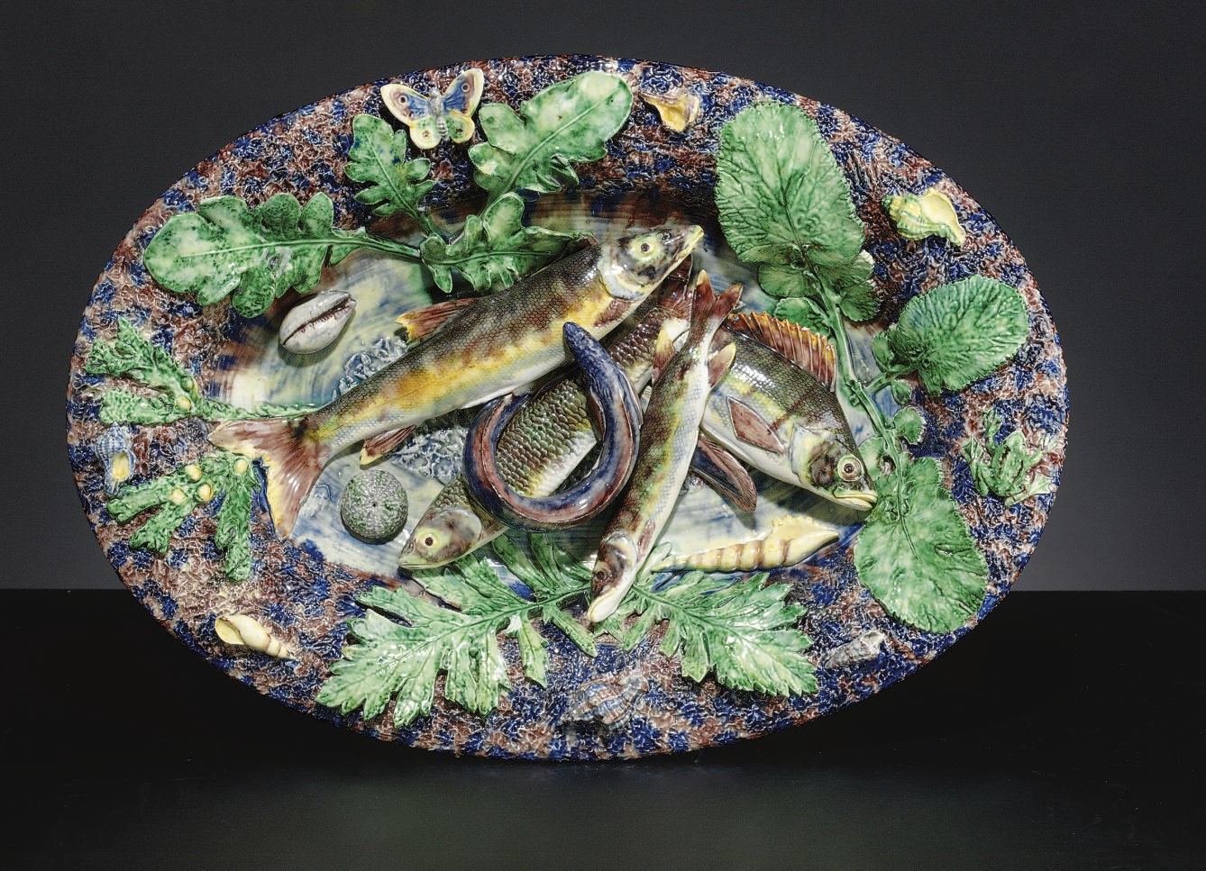 A FRENCH MAJOLICA PALISSY STYLE TROMPE L'OEIL PLATTER