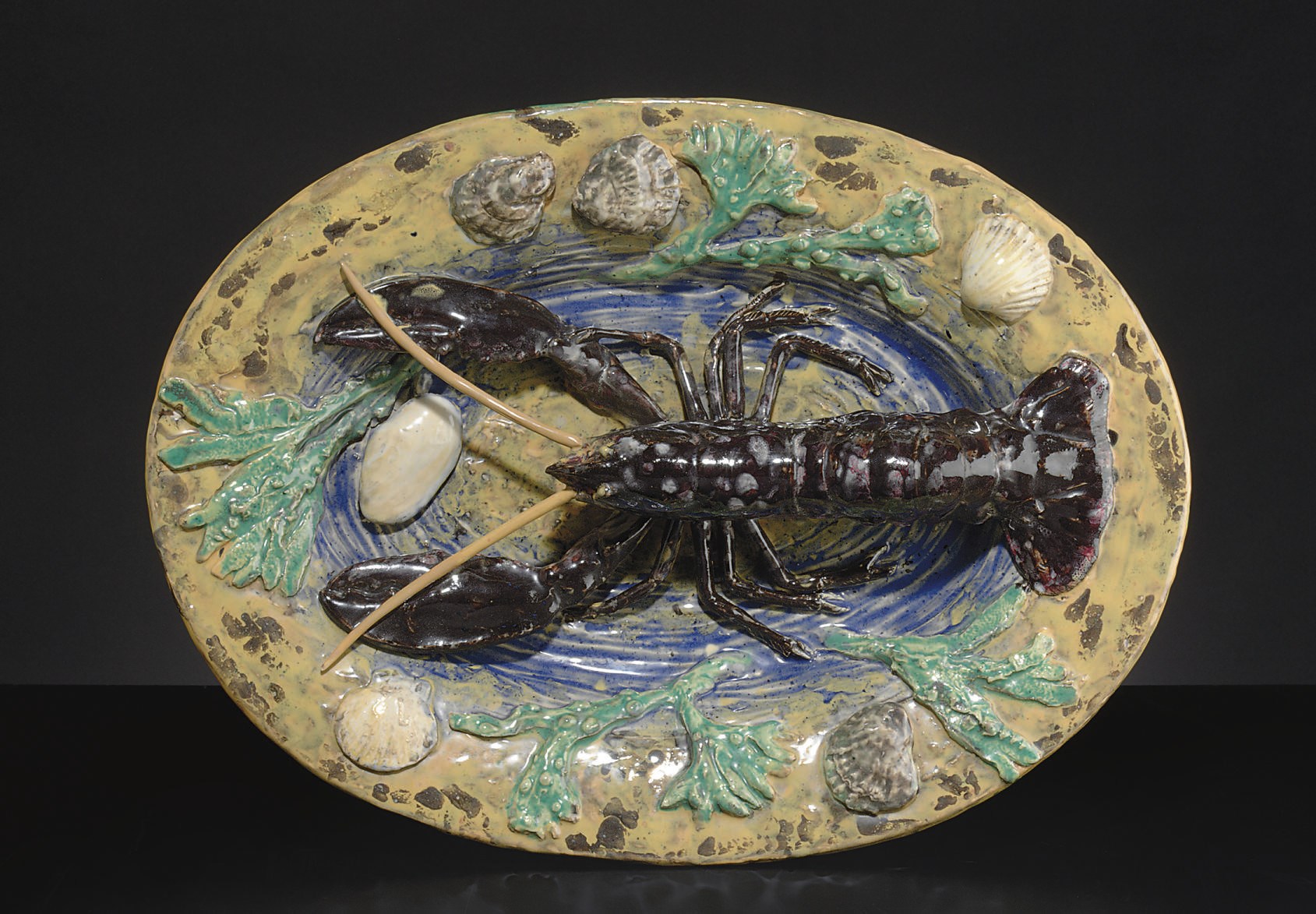 A LARGE FRENCH MAJOLICA PALISSY STYLE TROMPE L'OEIL PLATTER