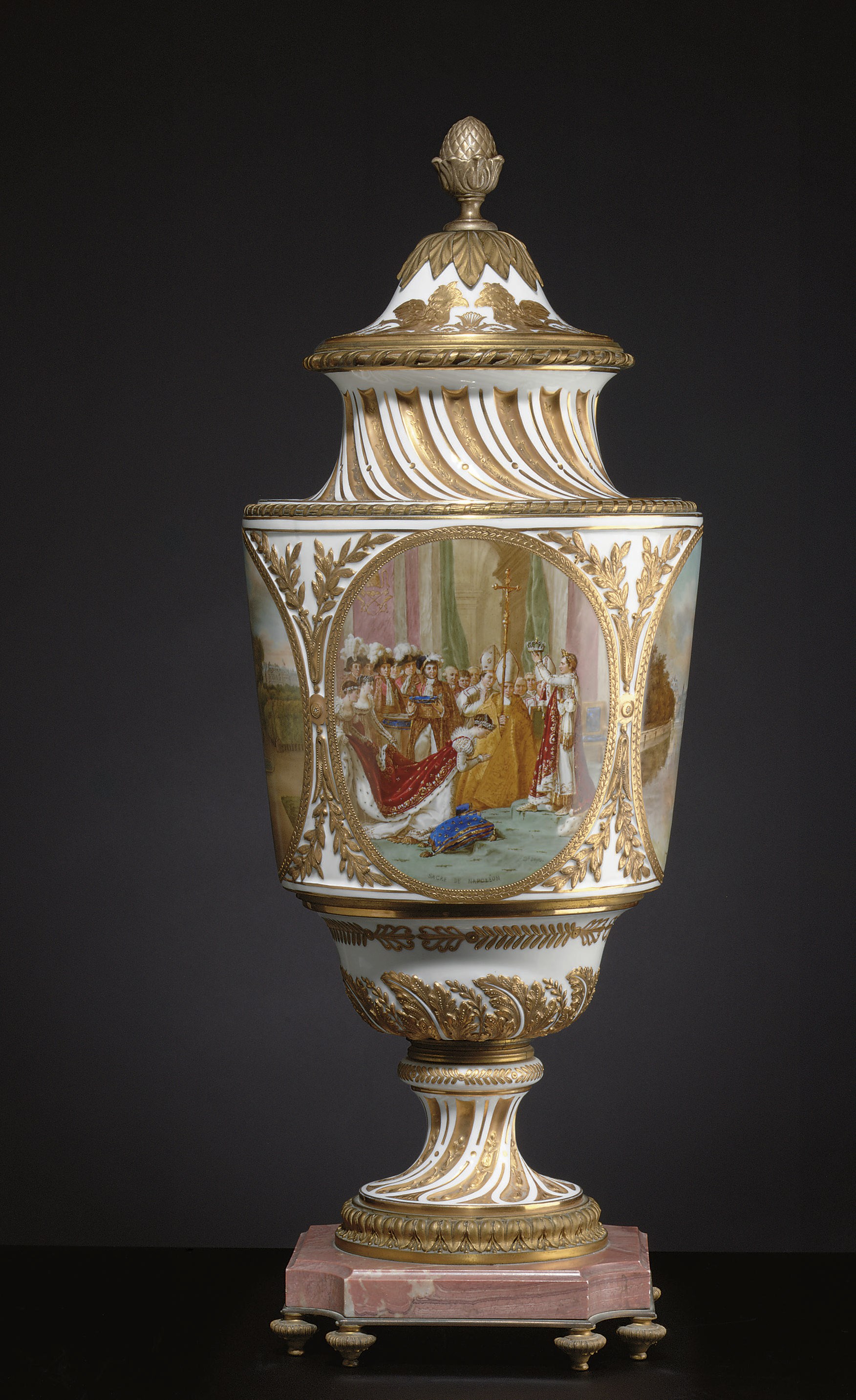 AN ORMOLU-MOUNTED SEVRES STYLE GILT-WHITE VASE AND COVER