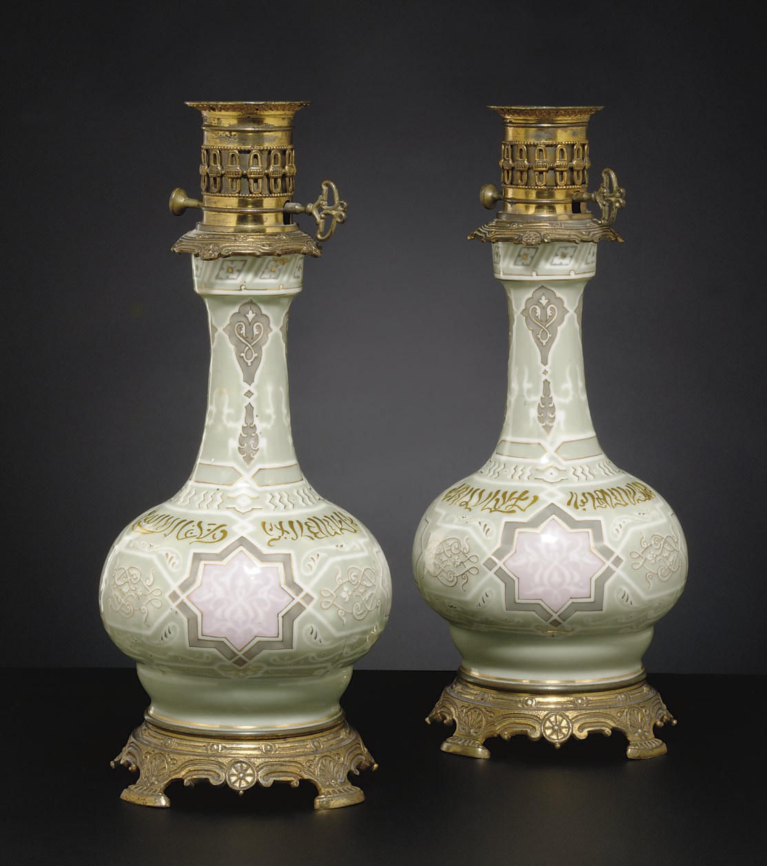 A PAIR GILT-METAL MOUNTED FRENCH CELADON-GROUND VASES