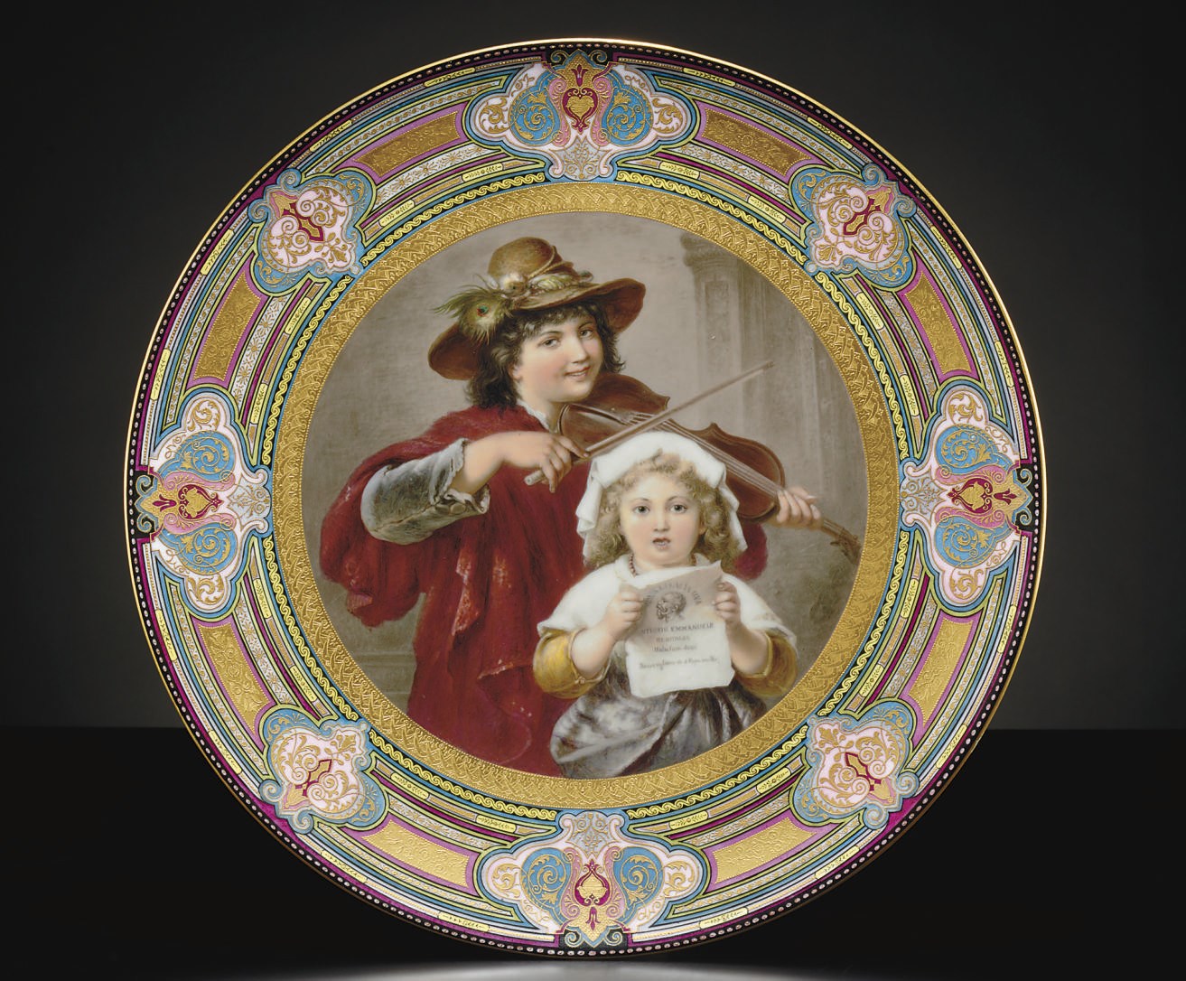 A VIENNA STYLE CLARET AND BLUE BANDED GOLD-GROUND CHARGER, 'EVIVA L'ITALIA UNAI'