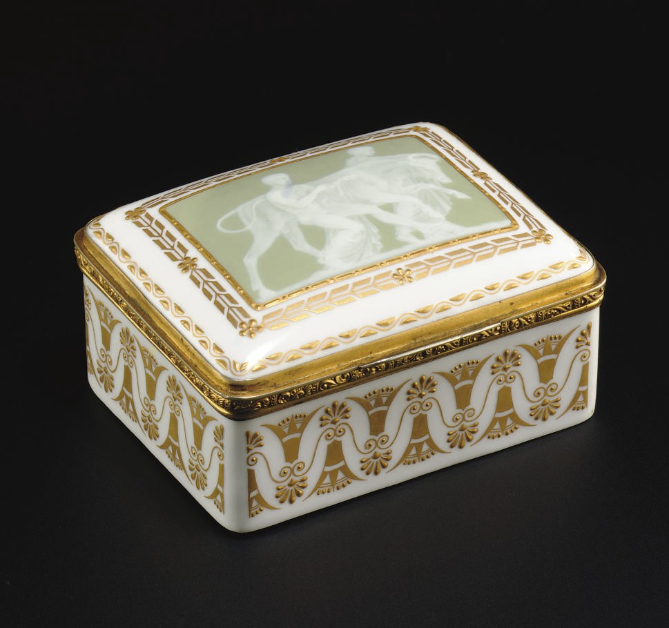 A BERLIN (K.P.M.) PATE-SUR-PATE CELADON AND GILT WHITE RECTANGULAR BOX AND COVER