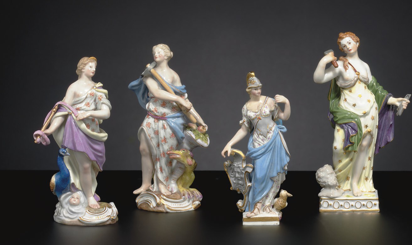 THREE MEISSEN FIGURES OF GODDESSES AND A MEISSEN FIGURE EMBLEMATIC OF SCULPTURE