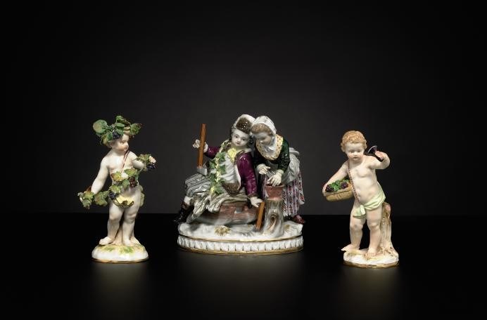 TWO MEISSEN FIGURES AND A MEISSEN FIGURE GROUP EMBLEMATIC OF THE SEASONS