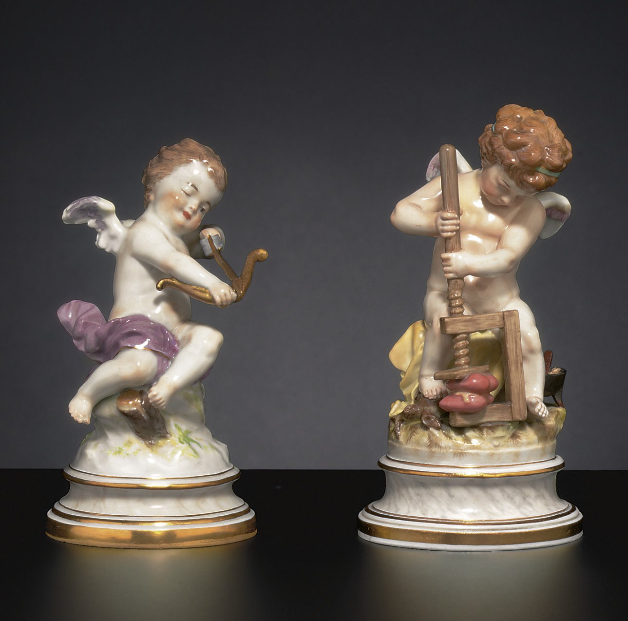 TWO MEISSEN FIGURES OF CUPID