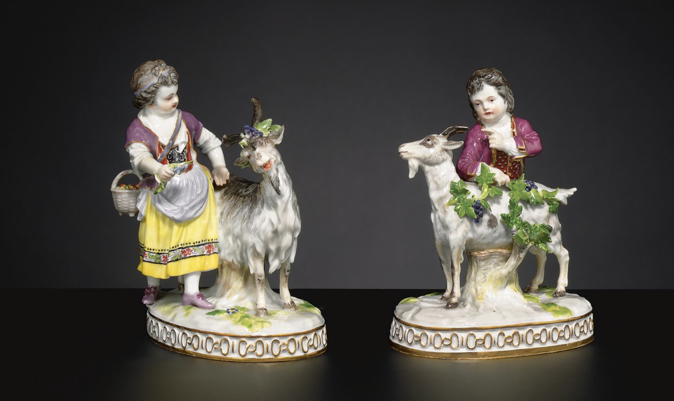 A PAIR OF MEISSEN COMPANION FIGURES WITH GOATS