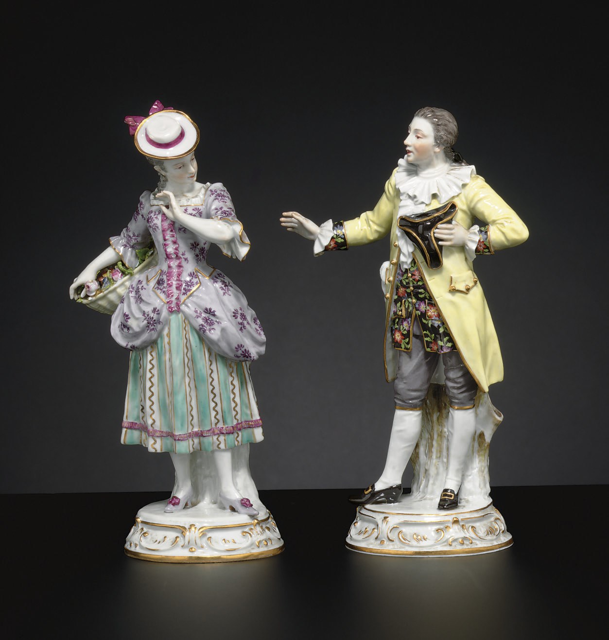 A PAIR OF MEISSEN FIGURES OF A GALLANT AND COMPANION