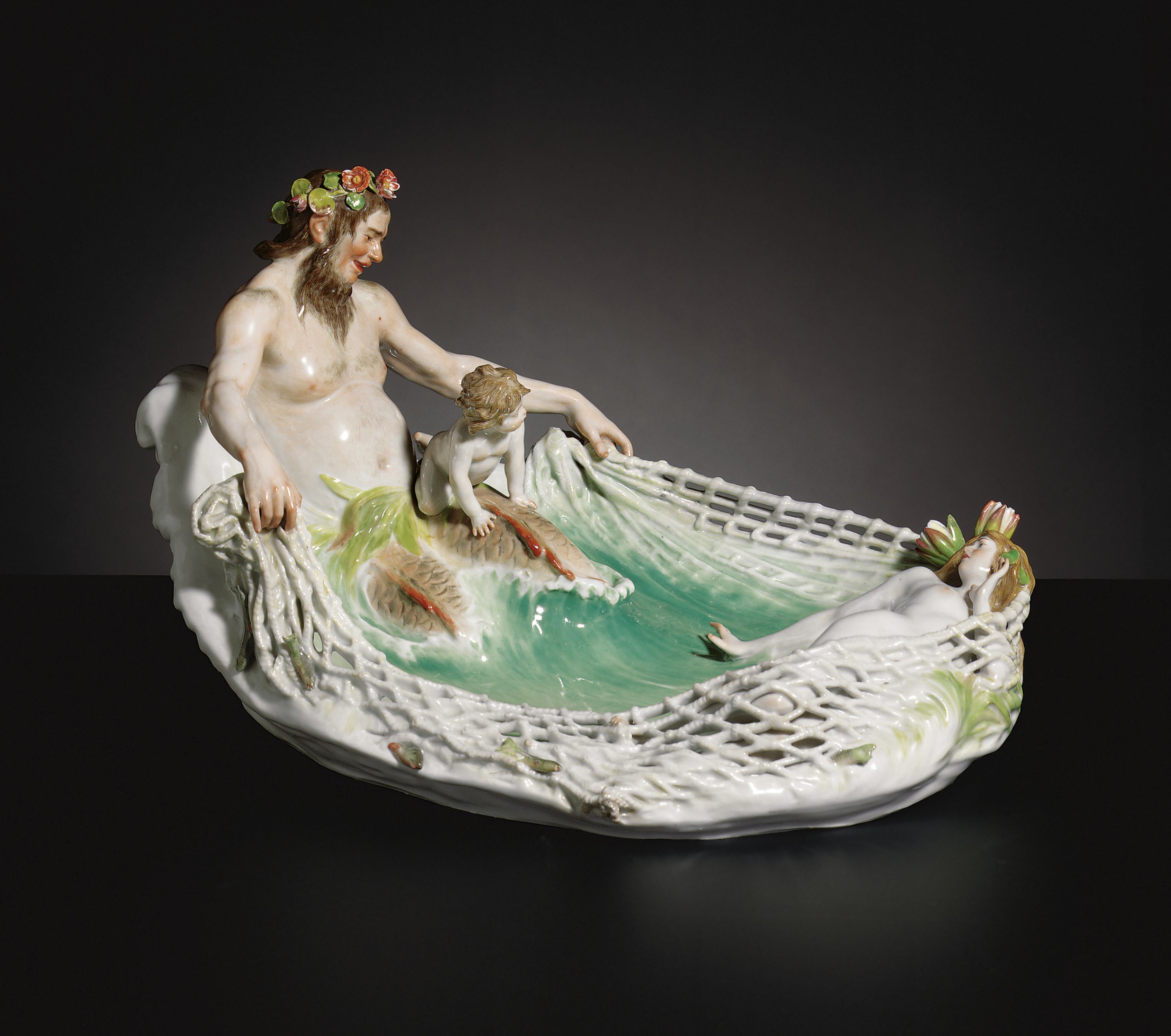A MEISSEN FIGURE GROUP OF A NYMPH BEING CAPTURED, 'TRITONENFANG'