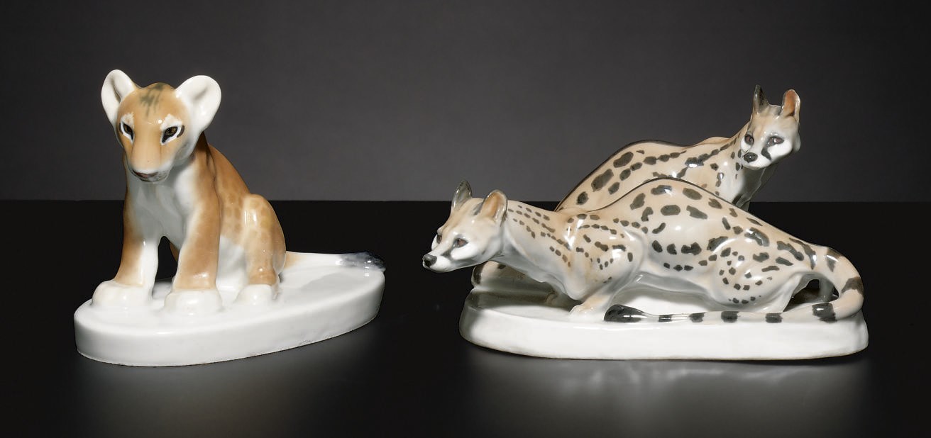 A MEISSEN FIGURE GROUP OF TWO CIVETS AND A MEISSEN TIGER CUB