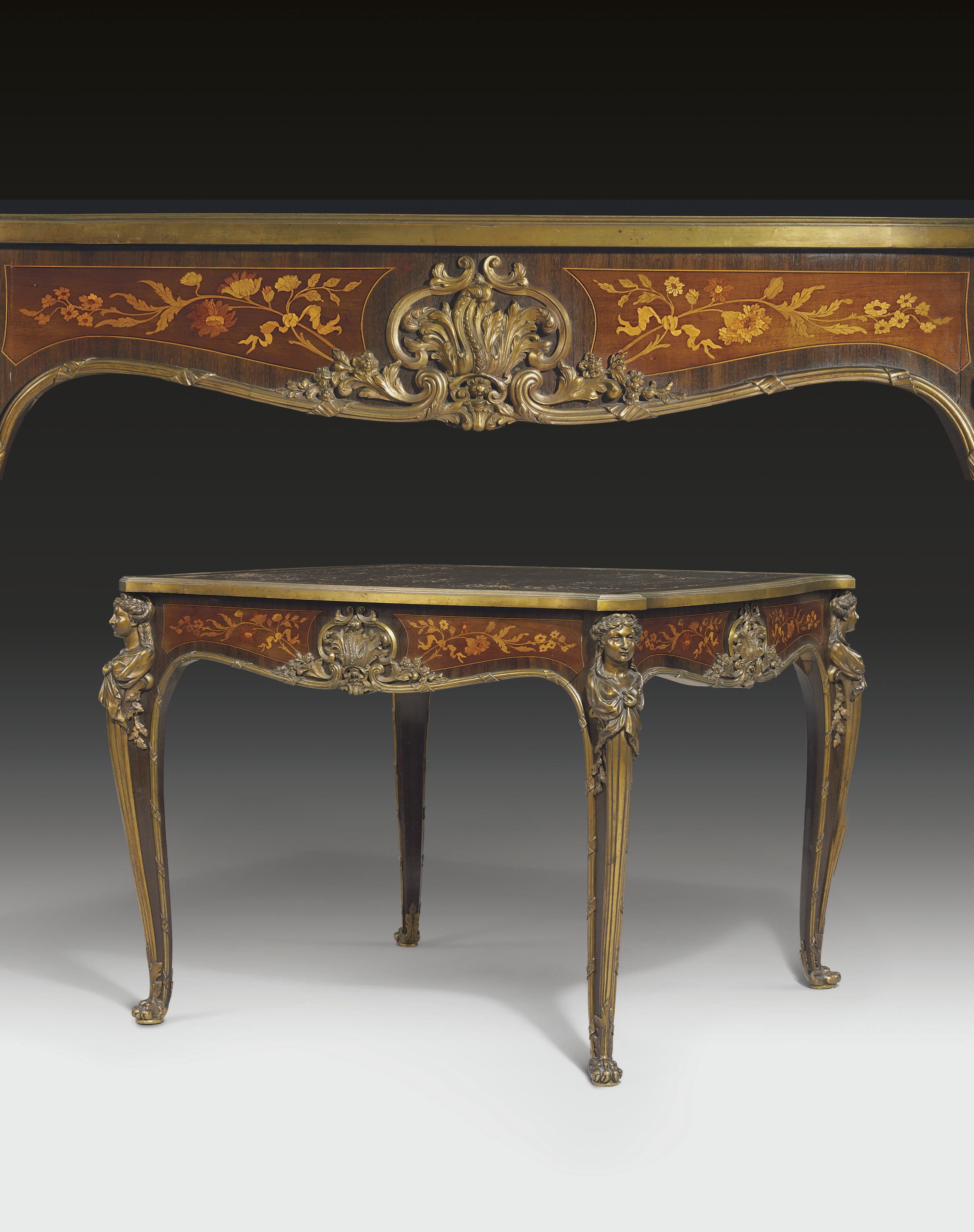 A FRENCH ORMOLU-MOUNTED MAHOGANY AND MARQUETRY CENTRE-TABLE
