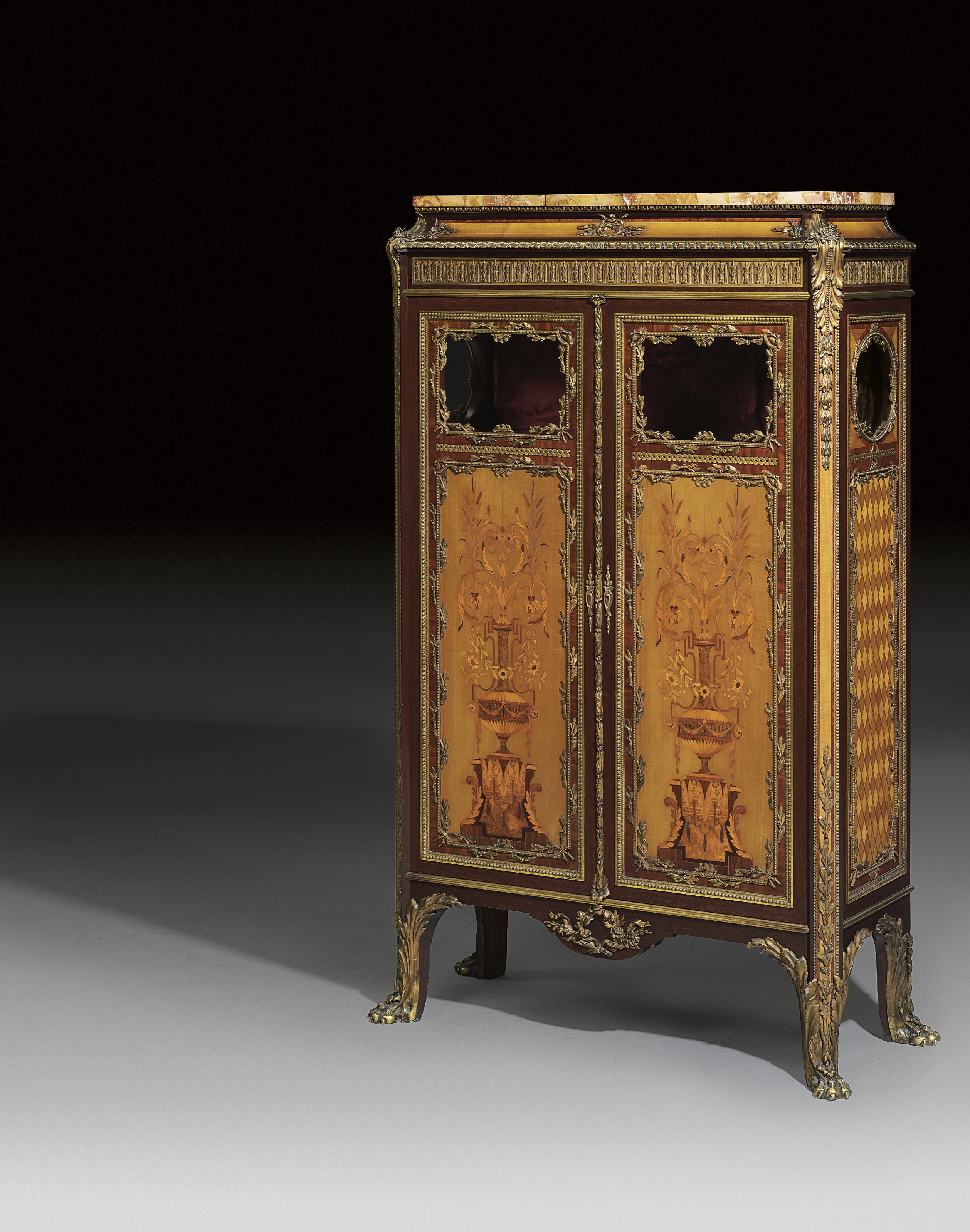 A FRENCH ORMOLU-MOUNTED MAHOGANY, AMARANTH, SYCAMORE, MARQUETRY AND PARQUETRY SIDE-CABINET