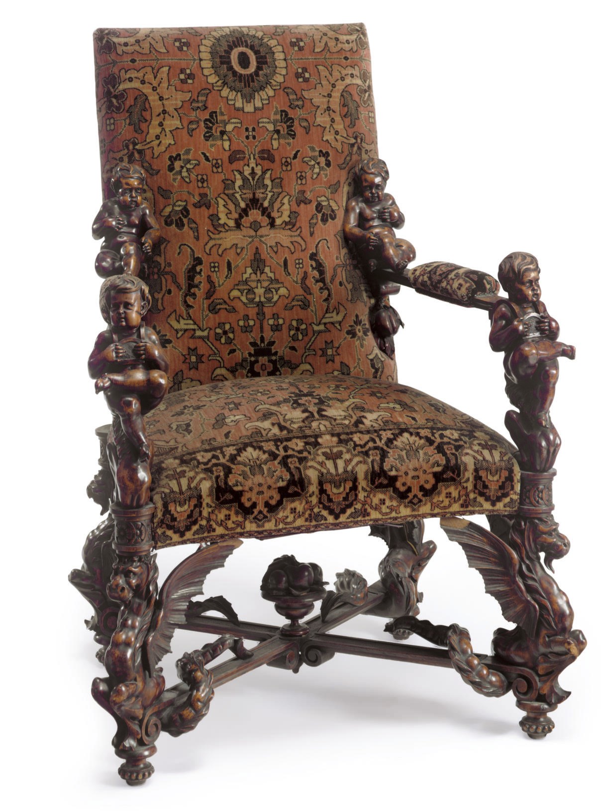 AN ITALIAN WALNUT ARMCHAIR