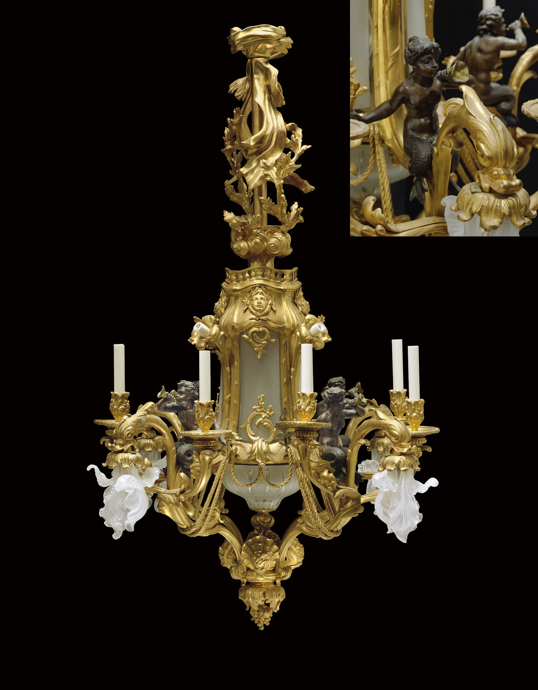 A FRENCH ORMOLU AND PATINATED BRONZE SIXTEEN-LIGHT CHANDELIER