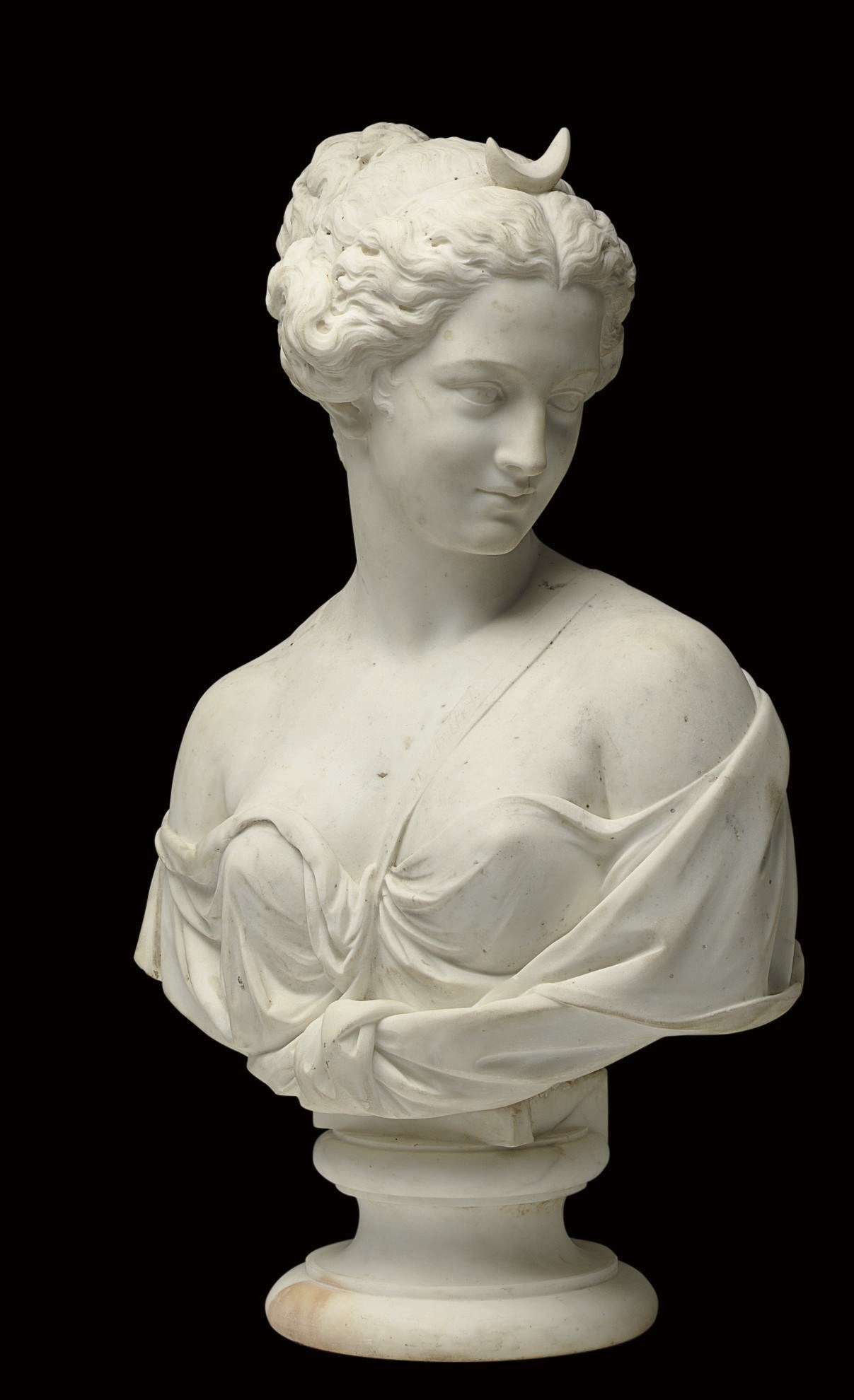 A FRENCH WHITE MARBLE BUST OF DIANA
