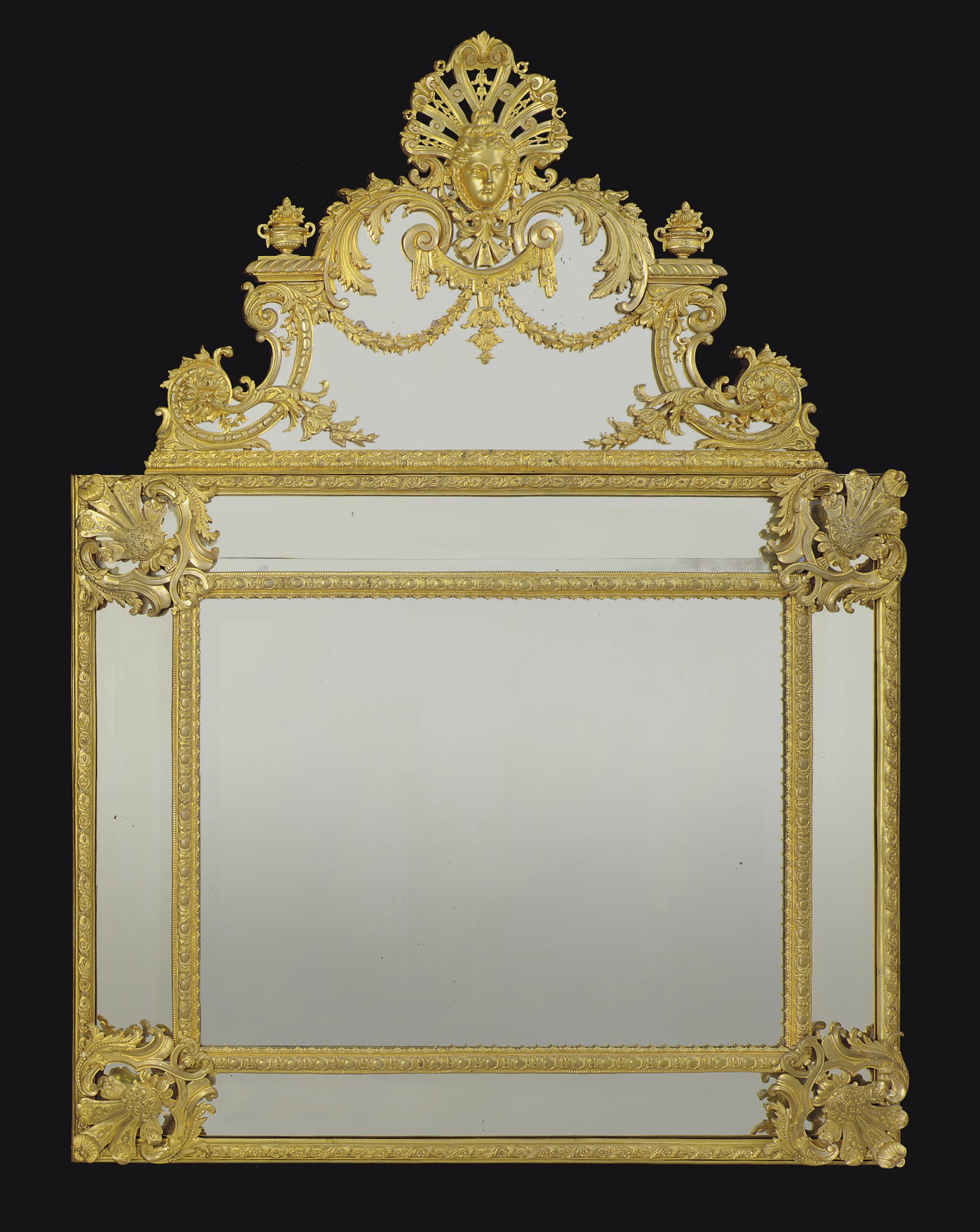 A FRENCH ORMOLU MIRROR