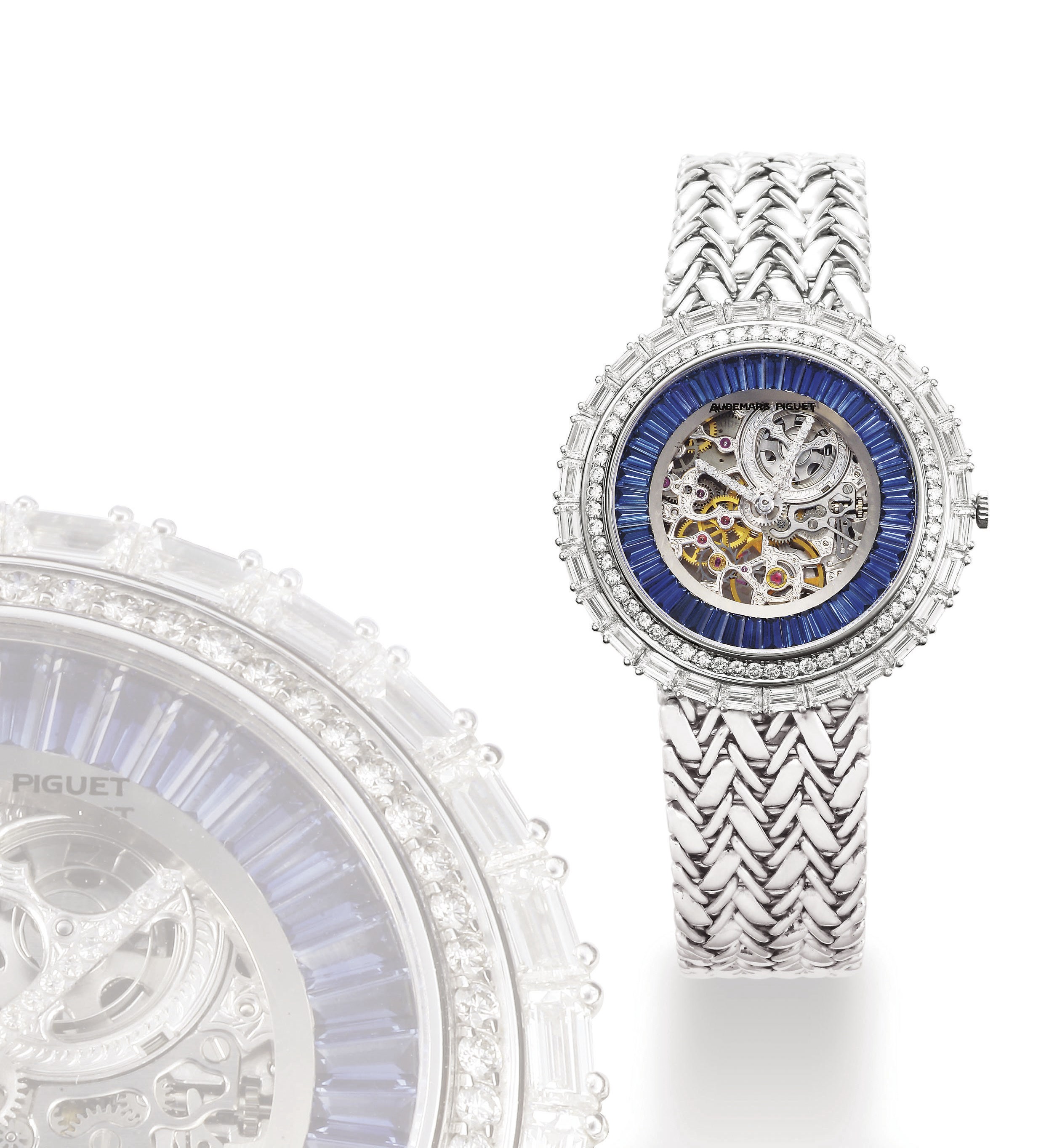 AUDEMARS PIGUET, SQUELETTE

WHITE GOLD AND SAPPHIRE-SET AUTOMATIC SKELETONISED BRACELET WATCH, BEZEL SET WITH 88 DIAMONDS WEIGHING ~4.60 CTS