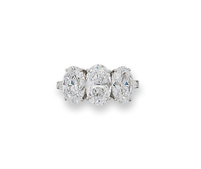 A DIAMOND THREE-STONE RING