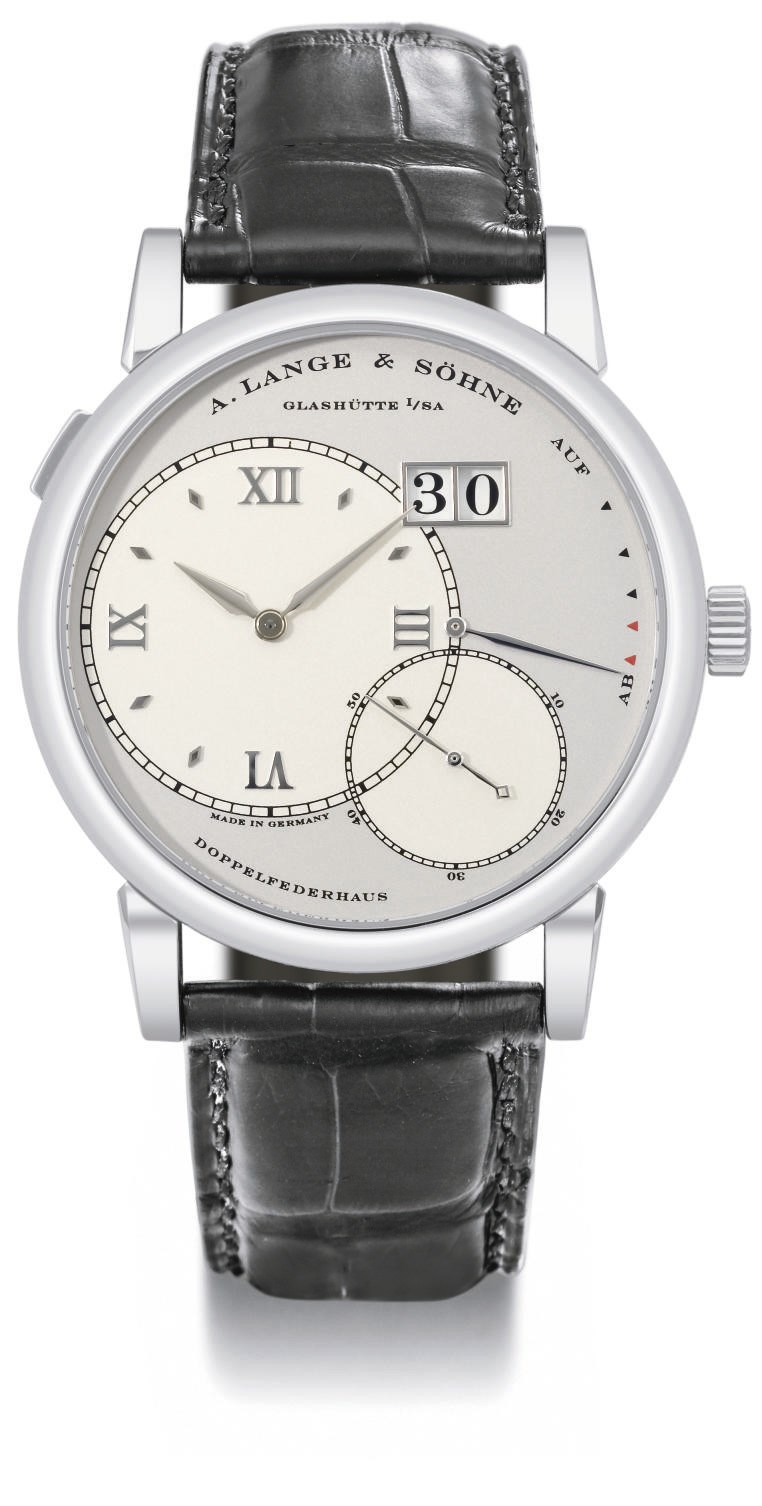 A. Lange & Söhne. A fine and rare platinum twin barrel wristwatch with oversized date and power reserve