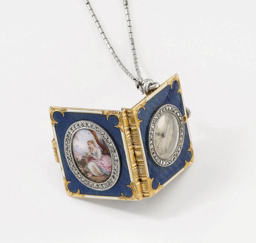 Swiss. An 18K gold, enamel and diamond-set book-form keyless lever pendant watch with chain