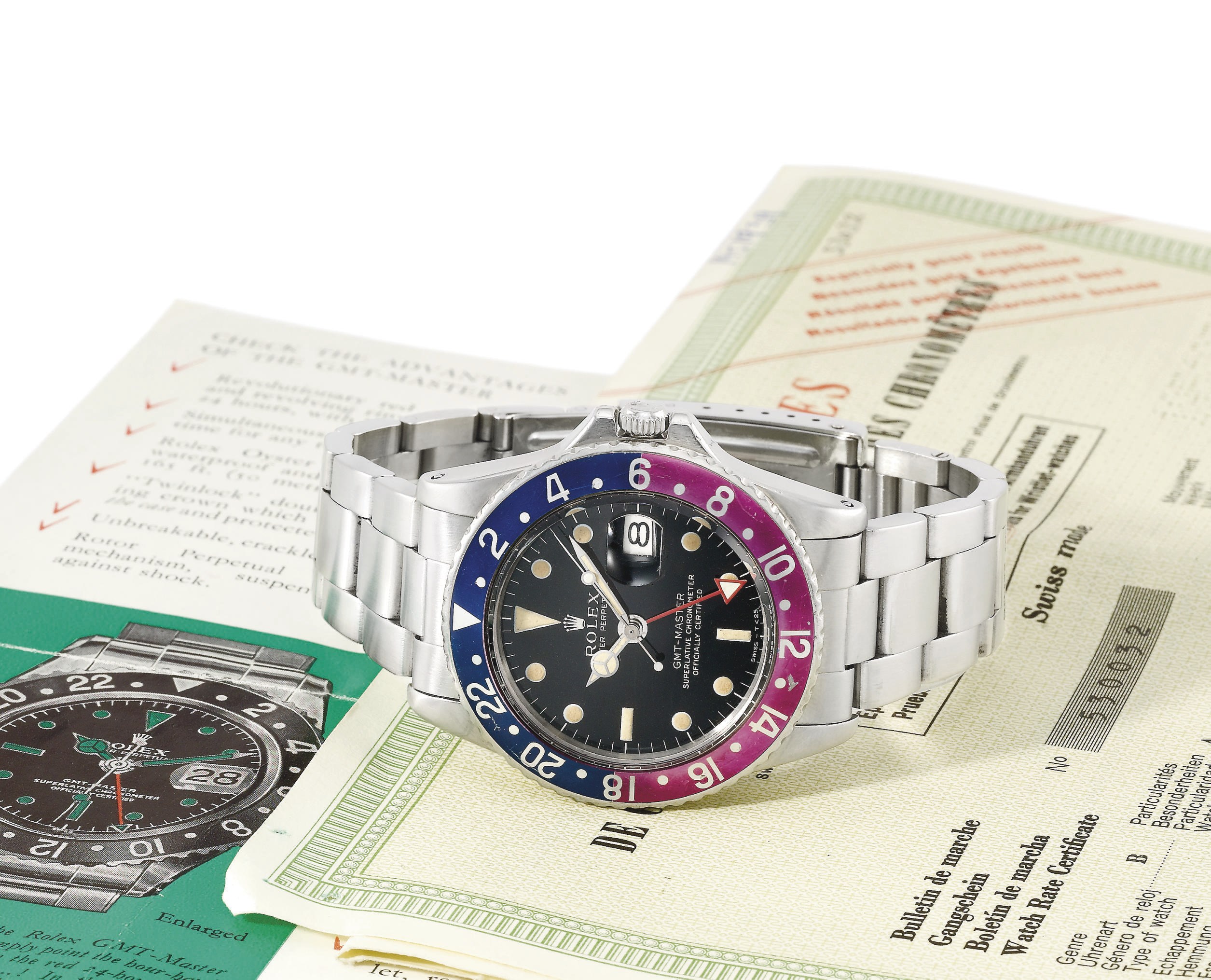 Rolex. A rare stainless steel automatic dual time wristwatch with sweep centre seconds, date, bracelet, rating certificate, original brochures and box