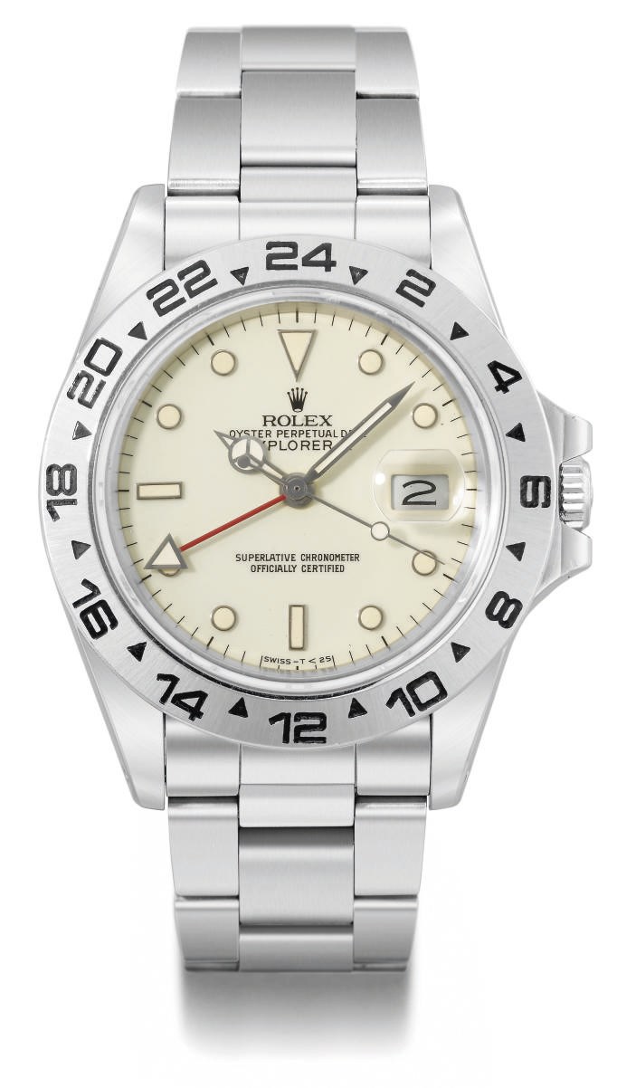 Rolex. A rare stainless steel automatic wristwatch with sweep centre seconds, date, 24 hour hand, bracelet, ivory-coloured "rail" dial and service invoice