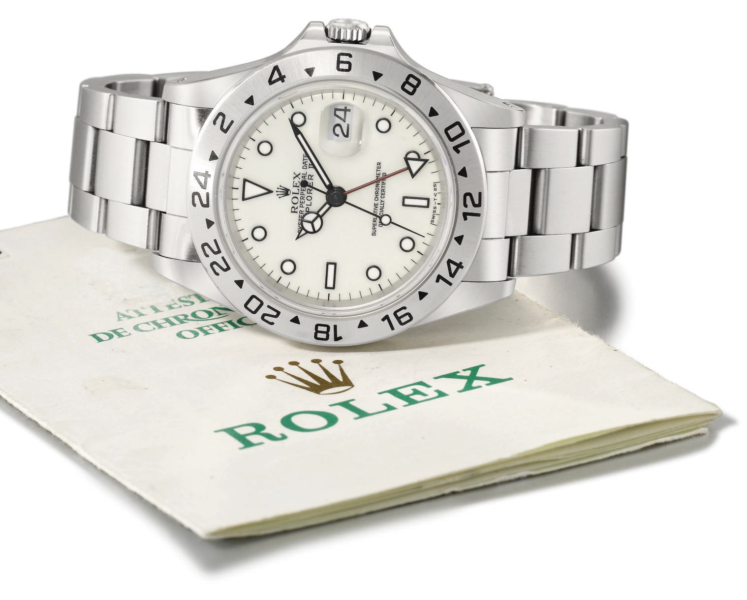 Rolex. A stainless steel automatic wristwatch with sweep centre seconds, date, 24 hour hand, white dial, box and certificate