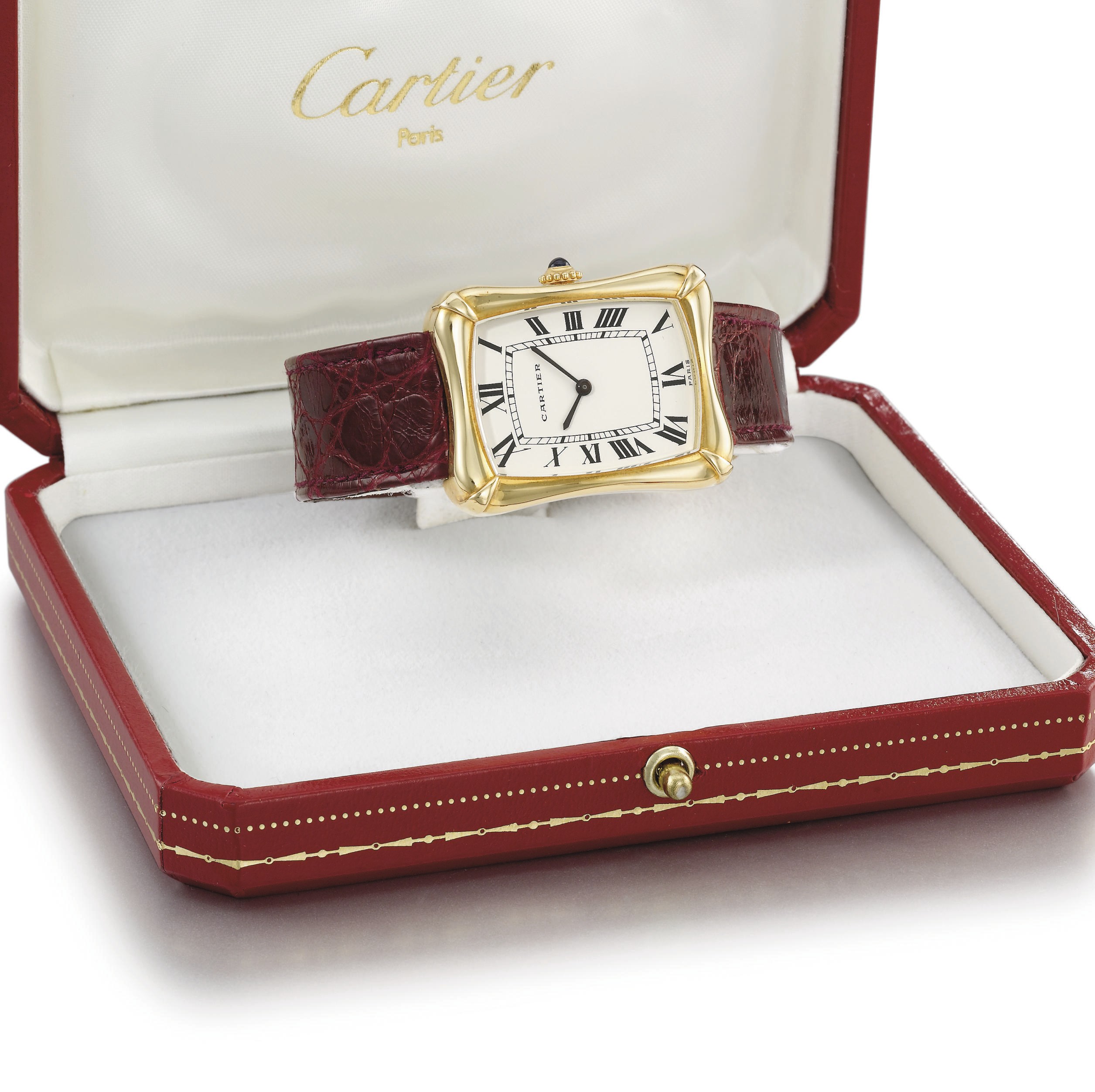 Cartier. An 18K gold rectangular-shaped wristwatch