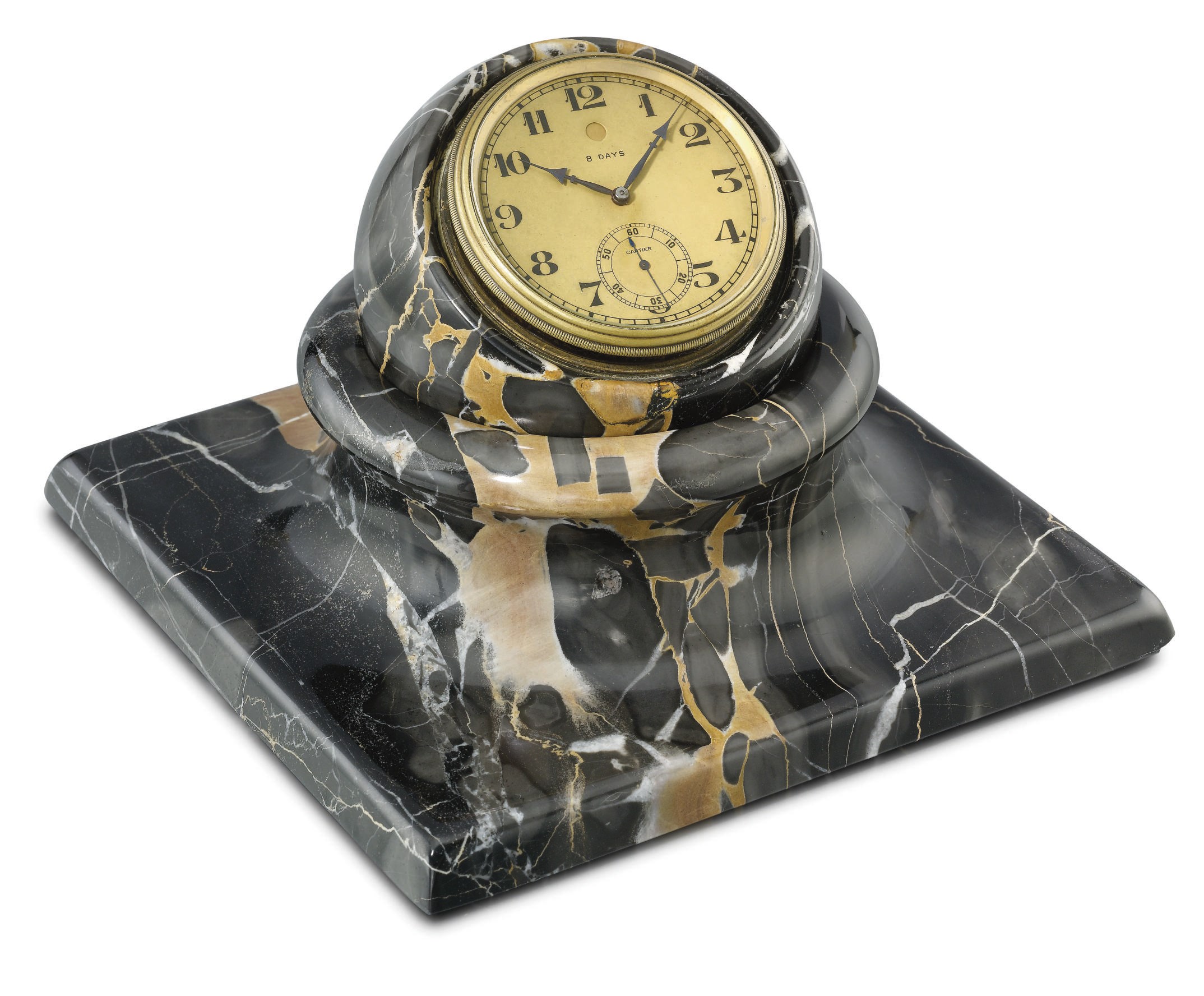 Cartier. A rare and unusual gilt brass and marble eight day spheric desk timepiece with stand