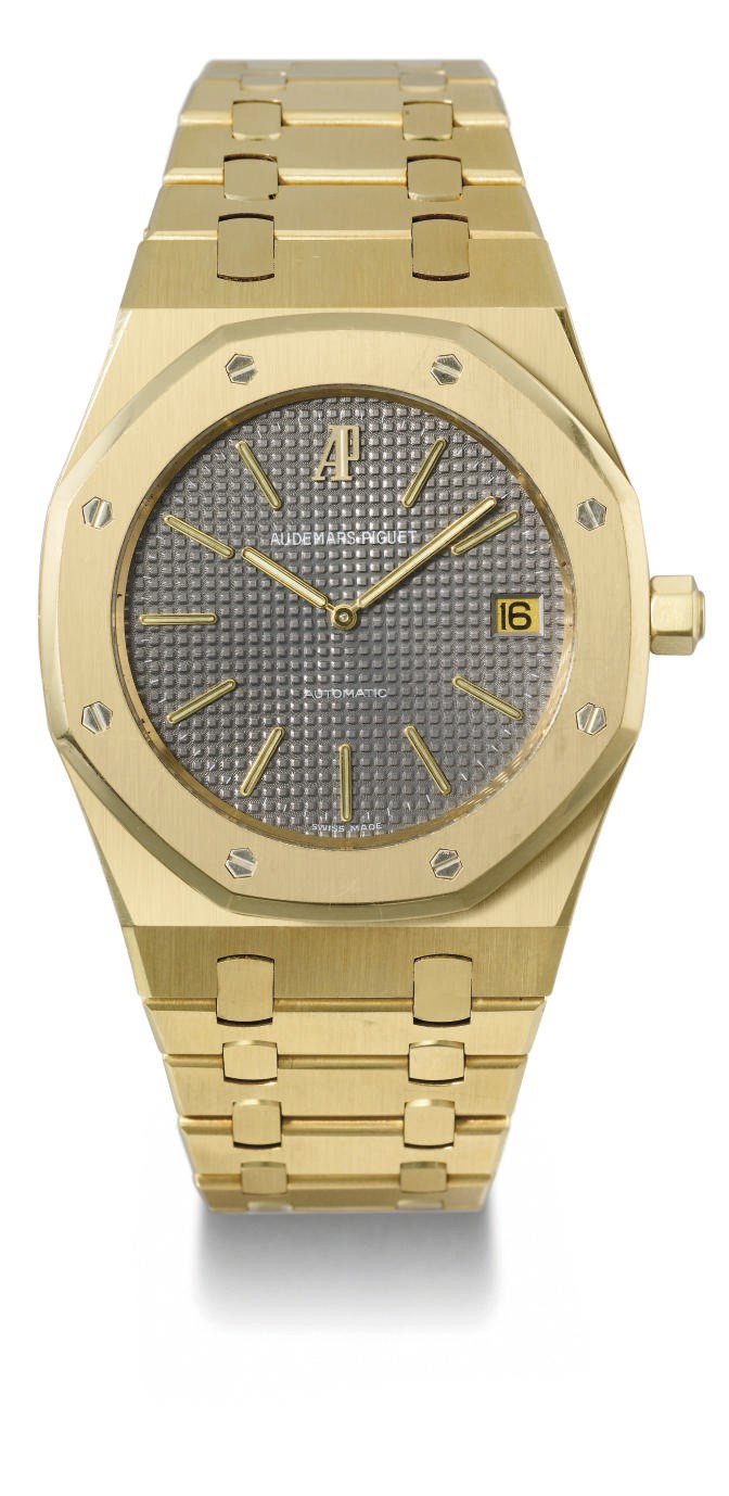 Audemars Piguet. A fine and large 18K gold limited edition automatic wristwatch with date, bracelet and glazed back