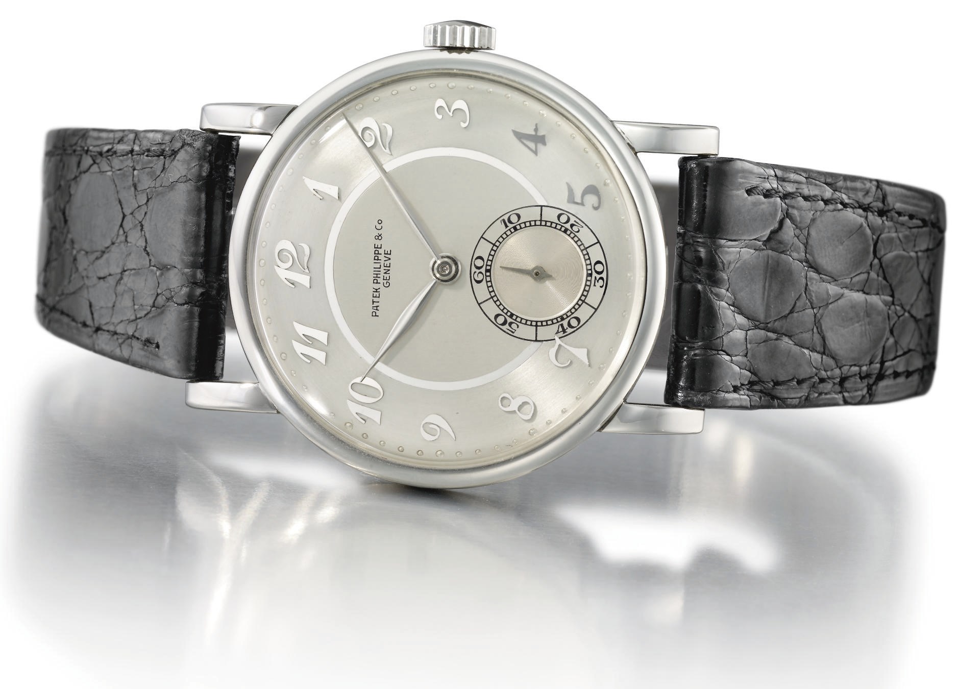 Patek Philippe. An extremely attractive and rare stainless steel wristwatch with two-tone silver dial and Breguet numerals