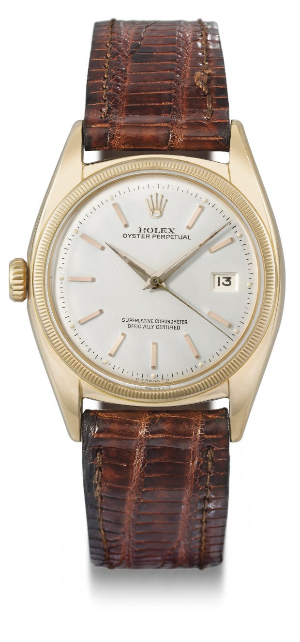 Rolex. An unusual and rare 18K pink gold automatic wristwatch with sweep centre seconds and date, transformed into a left-hander model