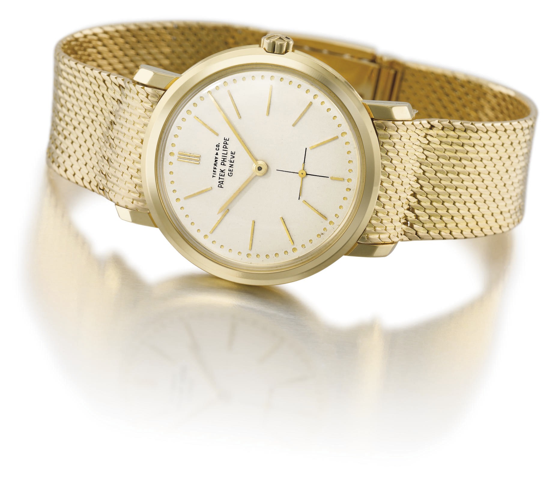 Patek Philippe, made for Tiffany & Co. A fine and rare 18K gold automatic wristwatch with bracelet