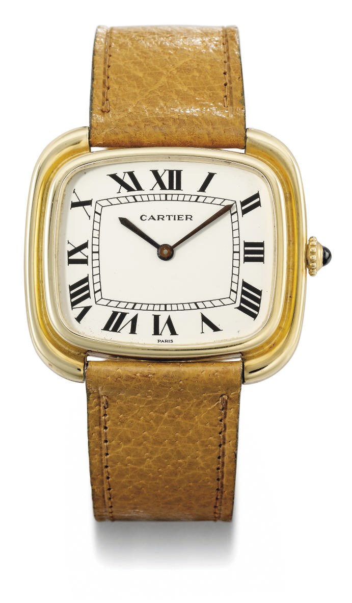 Cartier. An 18K gold oblong wristwatch
